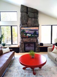 Concrete rock fireplace with painting